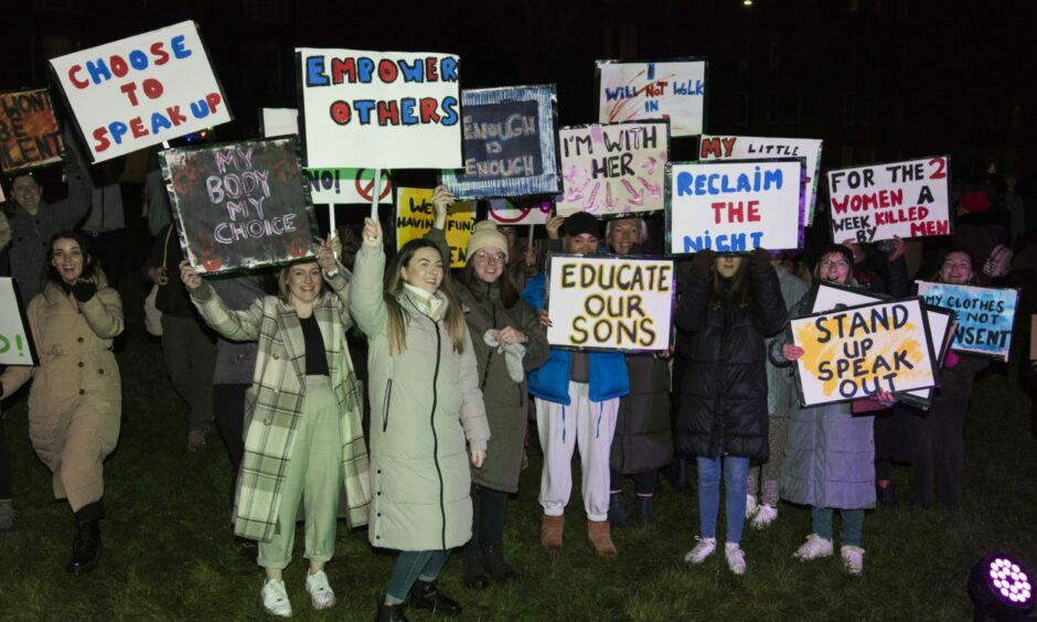 Participants held up placards with various messages on them. Image: Alan Richardson.