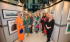 Left to right: Lesley Carroll, Susan Martin, Elaine Donnachie, Alison Henderson, Lina Molinaro, Susan Key and Pam Rodgers visit The Business Beats Cancer art exhibition in the Vision Building. Image: Steve MacDougall / DC Thomson