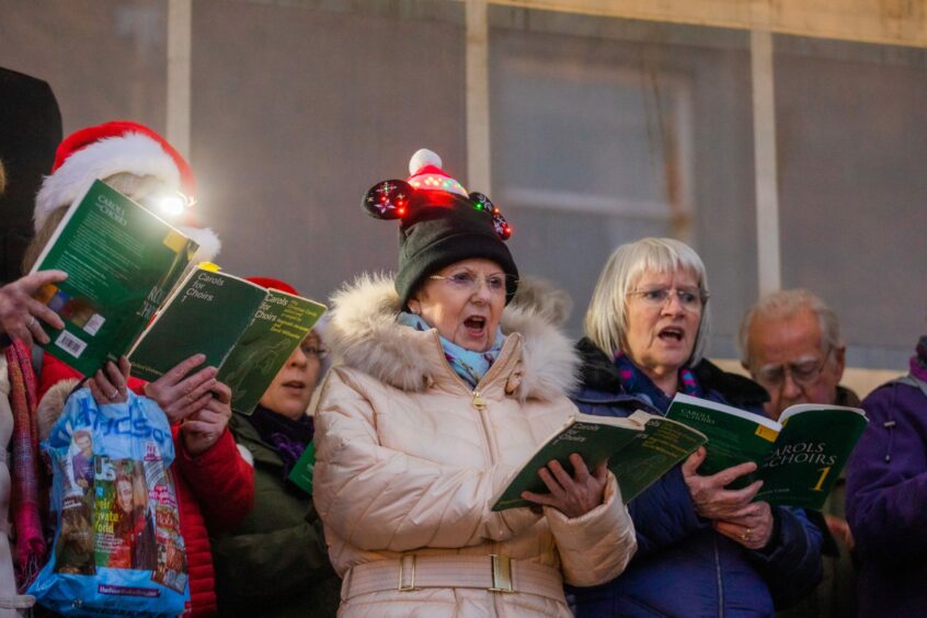 Carol singers in action. Image: Steve MacDougall/DC Thomson.