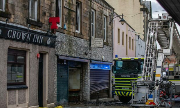 The Crown Inn pub is next door to the former jewellers that caught fire on Friday. Image: Steven Macdougall/DC Thomson.