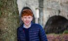 Kyle Munro, 17, left school and started his own website design and social media management firm K Munro. Image: Steve MacDougall/DC Thomson