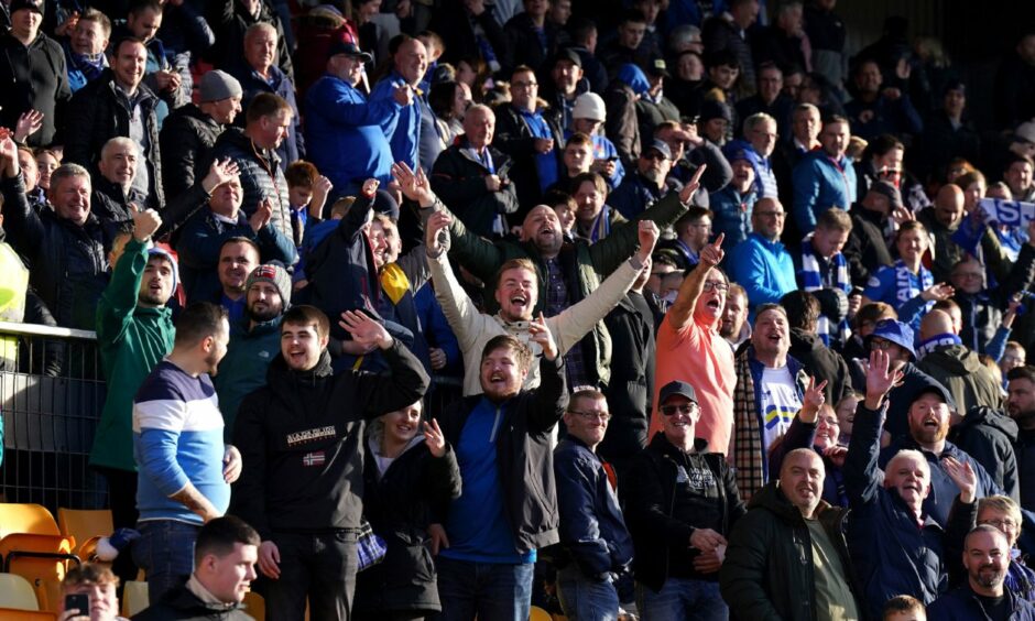 St Johnstone fans celebrate victory after the final whistle. Image: PA.