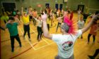 Fair Isle Primary held a fundraising dance-a-thon for Children in Need. Youngsters were dancing continuously for the fundraiser led by DJ Mikey Mowhawk. Image:  Steve Brown / DC Thomson
