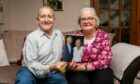 George (82) and Mabel Greenhill (79) at home in Arbroath after they received a Diamond Anniversary card from King Charles. Image: Steve Brown/DC Thomson.