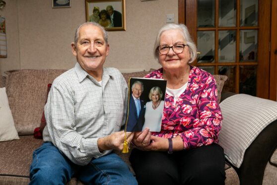 George (82) and Mabel Greenhill (79) at home in Arbroath after they received a Diamond Anniversary card from King Charles. Image: Steve Brown/DC Thomson.