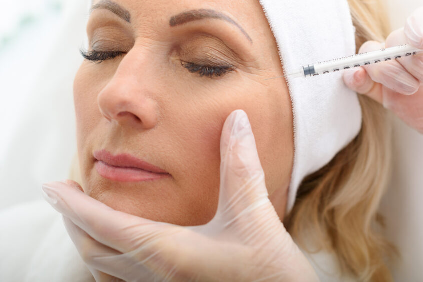 A photo of lady getting Botox, one of the facial aesthetics treatments available in Dundee.