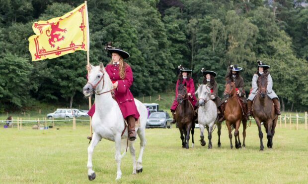 Volunteers re-enact the battle at Killiecrankie in 2018.