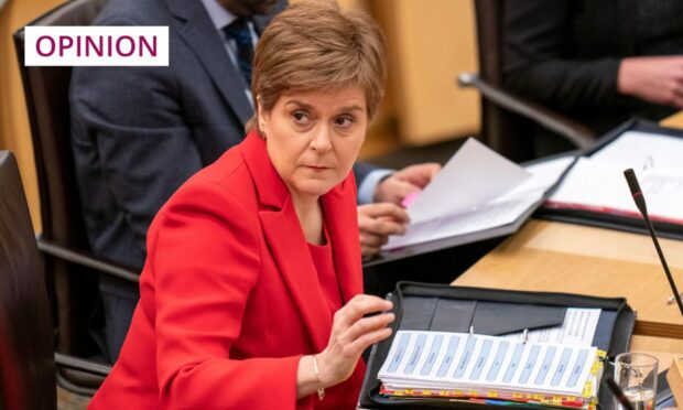 photo shows Nicola Sturgeon in the Scottish Parliament debating chamber