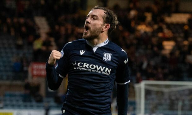 Dundee winger Paul McMullan celebrates a goal.