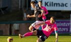 Rovers captain Scott Brown challenges Josh Mulligan for the ball. (Image: SNS).