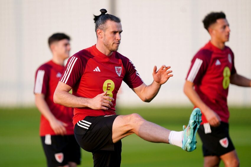 photo shows Wales captain Gareth Bale and team-mates training for the World Cup.