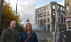 Michael Dix and his wife Eileen standing next to the remnants of the fire on Barrack Street. Image: Amie Flett/DC Thomson.
