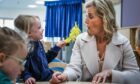 The Countess of Forfar with four-year-old Jessica Boyd at the town's early learning centre during Tuesday's Royal visit. Image: Mhairi Edwards/DC Thomson.