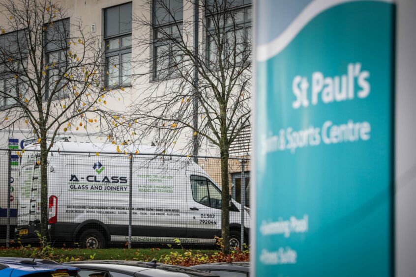 A glazier's van parked at St Paul's RC Academy