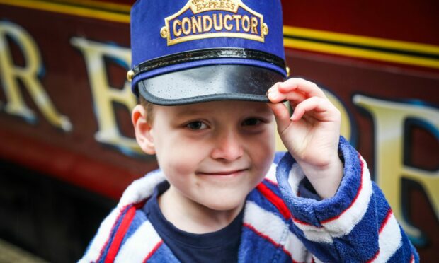 Five-year-old Angus Hogg was one of the early passengers this year. Image: Mhairi Edwards/DC Thomson.