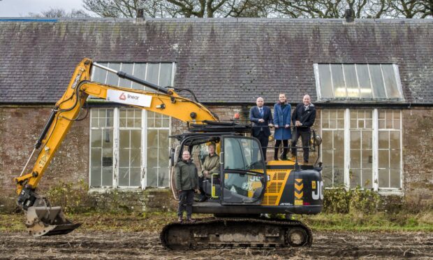 Hospitalfield director Lucy Byatt (in the cab) joined by Culture Minister Neil Gray, Angus councillors Mark McDonald and Serena Cowdy and board member David McAllister for the start of the next stage of work. Image: Euan Cherry/Hospitalfield