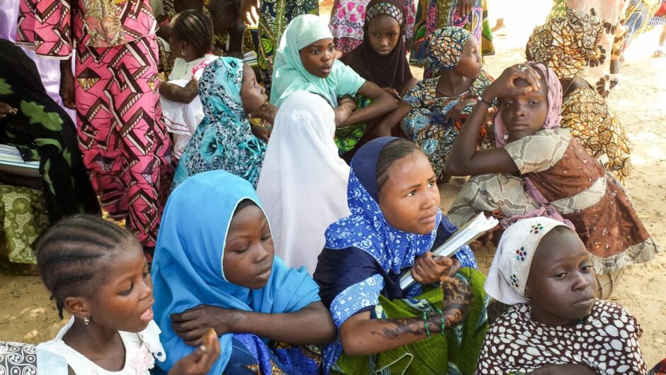 photo shows schoolgirls outside their school in Niger.