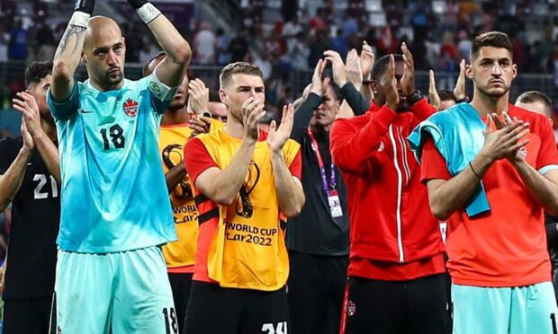 David Wotherspoon and his team-mates applaud the Canadian fans after their defeat to Croatia in the World Cup.