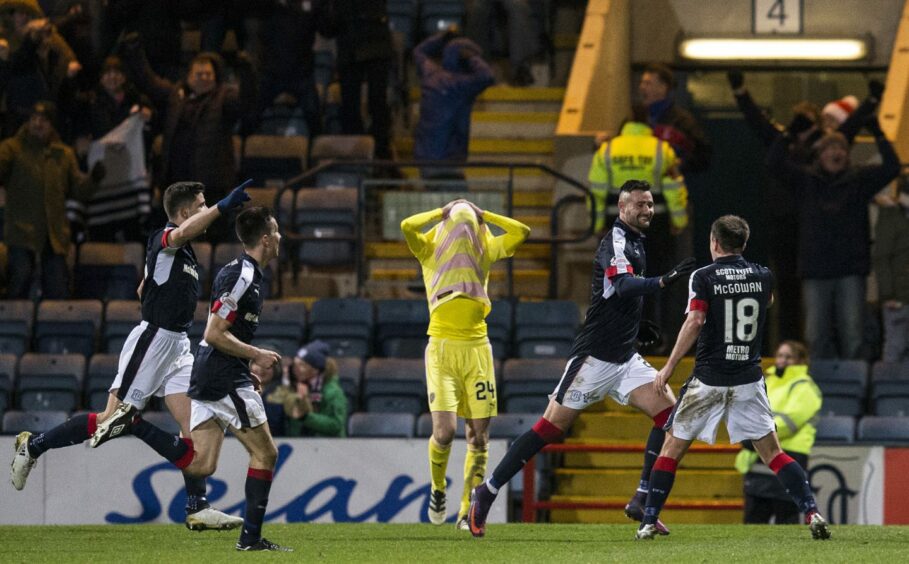 Marcus Haber peels away to celebrate against Hearts
