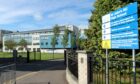 Secondary schools in Dundee will only be open to senior pupils and all Fife secondary schools will shut on December 8 due to strike action by teachers. Pictured is St John's RC High School on Harefield Road, Dundee. Image: DC Thomson.