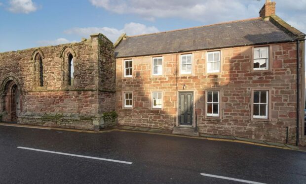 The house at 2 Maison Dieu Lane is attached to the ruins of Maison Dieu Chapel. Image: Thorntons