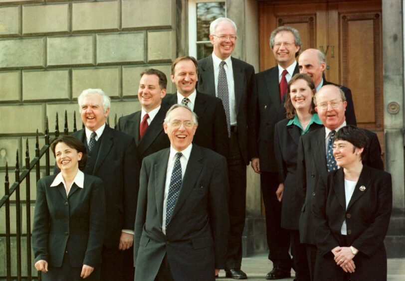 Photo shows the first ever Labour/Liberal democrat coalition cabinet of the new Scottish Parliament, standing around First Minister Donald Dewar.