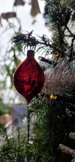Small red Christmas bauble.