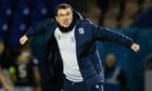 Dundee manager Gary Bowyer celebrates at Inverness after Dundee's win