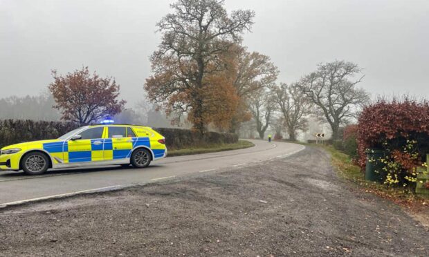 A police car blocking the A93 Perth to Blairgowrie road. Image: Allan Gray.