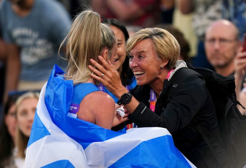 Eilish McColgan celebrates her 10,000 metres victory with her mum Liz