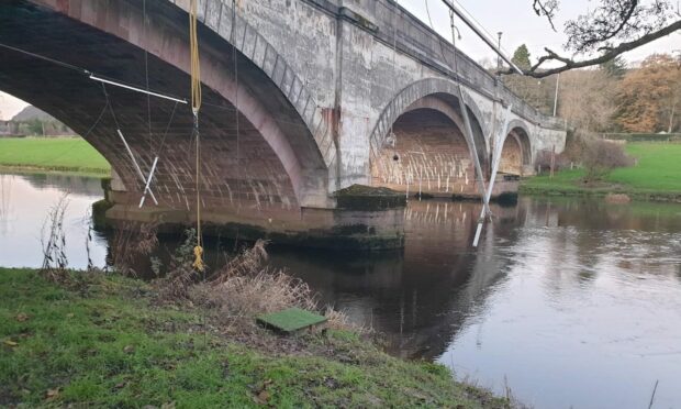 The wires were damaged on the River Earn in Bridge of Earn. Image: Police Scotland/Facebook.