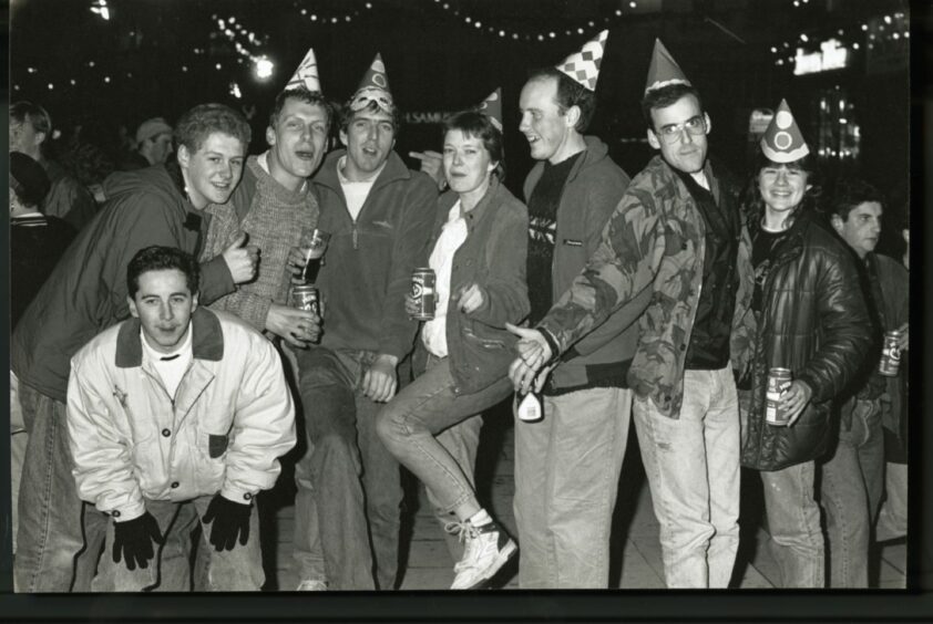 people enjoying Hogmanay celebrations in Dundee City Square in 1990
