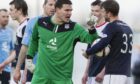 Dundee goalkeeper Kyle Letheren rages with Rory Loy of Falkirk in 2014. Image: SNS.