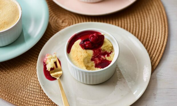 The white chocolate souffles with raspberry sauce.