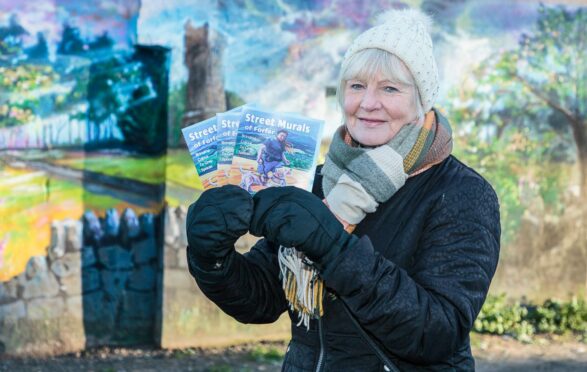 Forfar councillor Lynne Devine with the walking trail maps.