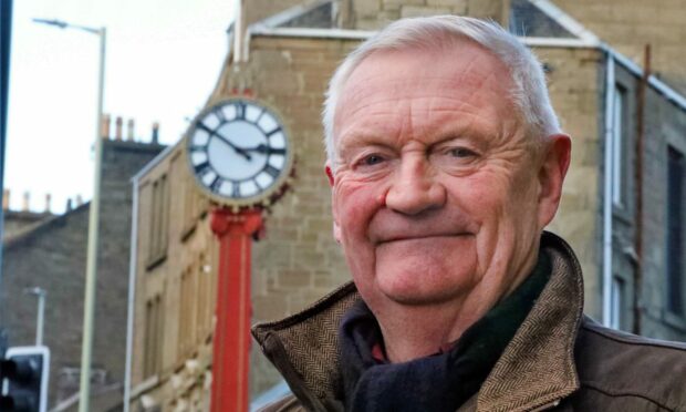 Alan Steadman in front of the Hilltown Clock. Image: Gareth Jennings/DC Thomson.