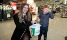Baldragon Academy pupils fundraised for local foodbanks by carol singing at Tesco Extra, Kingsway. Image: Gareth Jennings/DC Thomson.