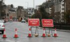 The road remains closed at Claypotts junction in Broughty Ferry due to a gas leak.