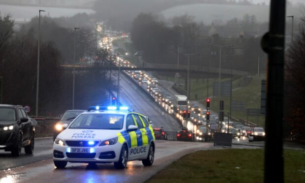 A car crash on Forfar road heading into Dundee is causing long tailbacks. Image: Gareth Jennings/DC Thomson.