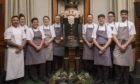 The Gleneagles culinary team with the Nutcracker they made out of chocolate.