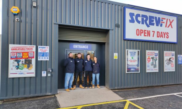 Staff outside the new Screwfix store in Blairgowrie Image: Screwfix.