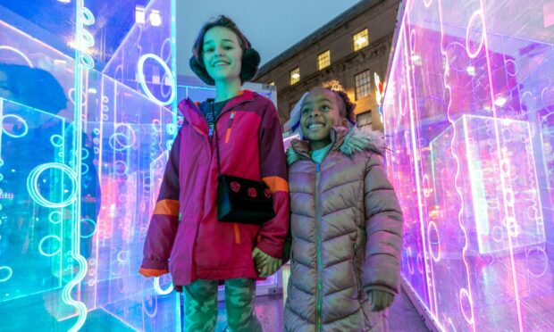 Nina and Faith Harris are wowed by the Heofon Maze, City Square, Dundee. Image: Kim Cessford / DC Thomson