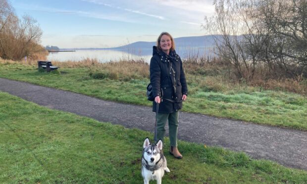 Briony McDonald and husky at Loch Leven