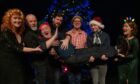 ; Fun-loving Phil Cunningham gets a festive lift from his Christmas Songbook friends.