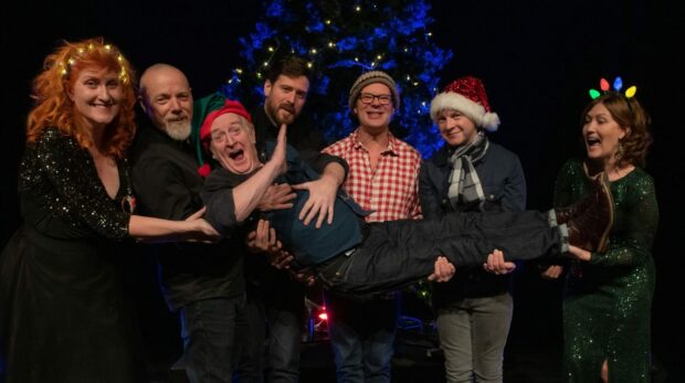 ; Fun-loving Phil Cunningham gets a festive lift from his Christmas Songbook friends.