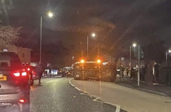 The car overturned on Admiralty Road in Rosyth. Image: Fife Jammer Locations Facebook.