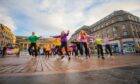Young people taking part in the flash mob at Dundee's City Square on Friday. Image: Steve MacDougall/DC Thomson.