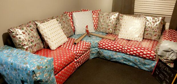 An elf wrapped up the sofa at Sammi-jo Gray's home in Arbroath. Image submitted.