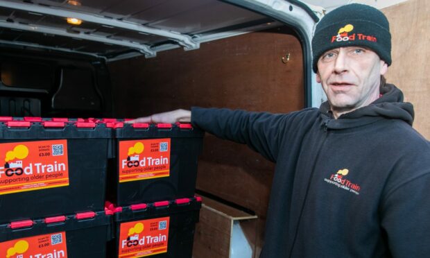 Gary is one of eight volunteers delivering groceries to Dundonians in need. Image: Steve Brown/DC Thomson