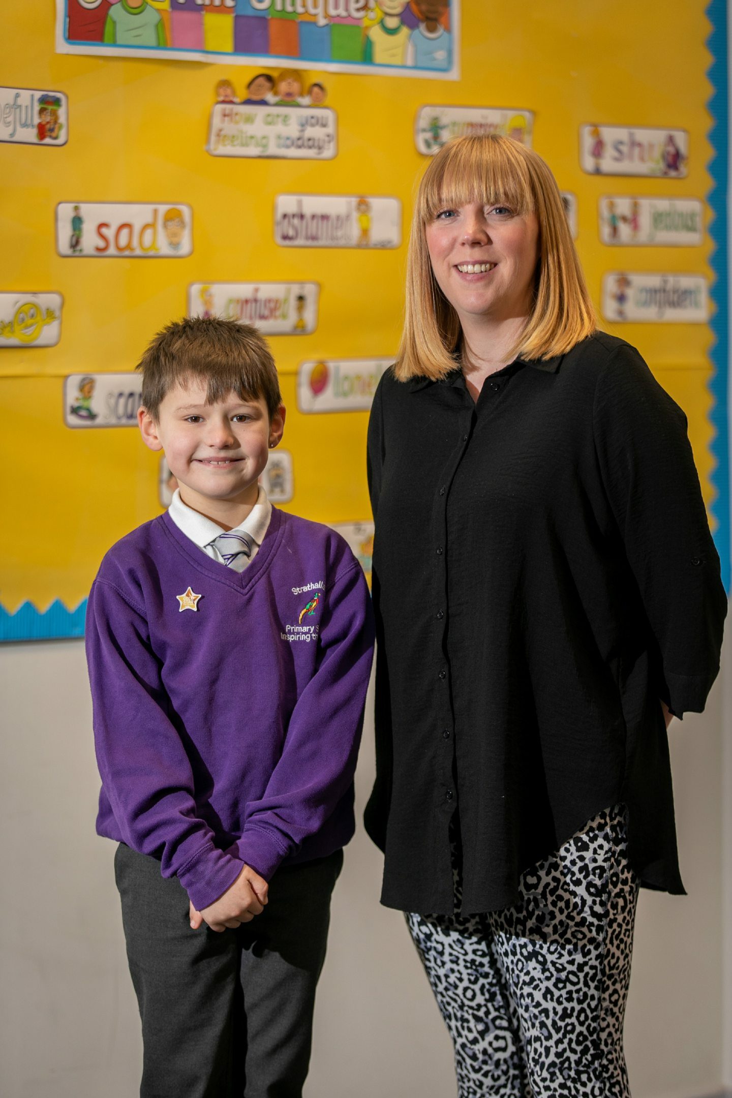 Jay Edmiston, 8, with teacher Kerry Reid-Matharu. Image: Steve Brown / DC Thomson